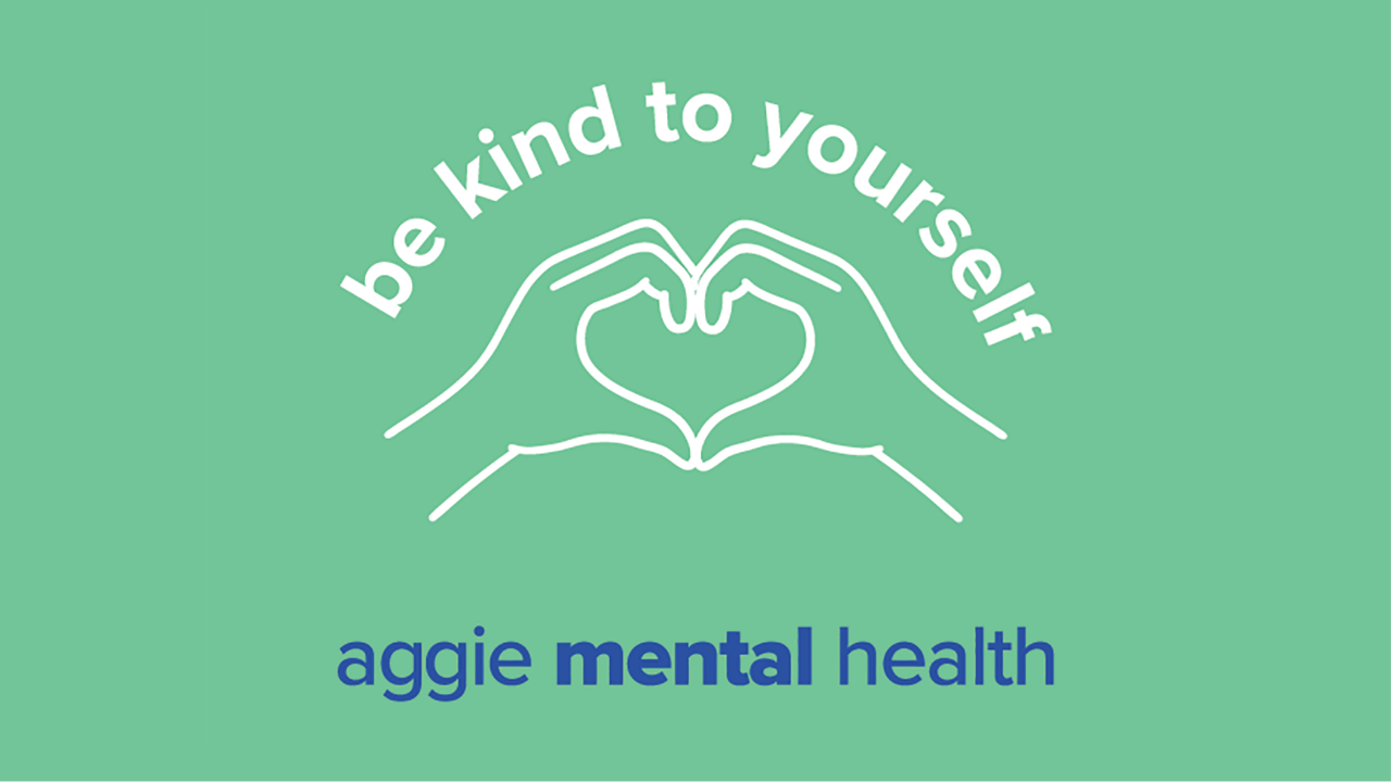 The image features a mint green background with white and yellow text and graphics. At the top, white text reads ‘be kind to yourself,’ serving as a positive affirmation. Below this text, there is a graphic of two hands forming a heart shape. Underneath the hands, in yellow text, it says "aggie mental health."